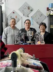  ??  ?? Volunteers Tania Lousi, Linda Hemara and Annie Rewharewha man the new Grateful store.