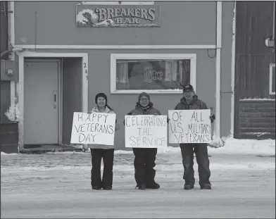  ?? Photo by Nils Hahn ?? HONORING VETERANS— Janelle Otton, Fannie Nassuk and her husband Wayne Nassuk, a National Guard Veteran, celebrated Veterans Day in Nome.