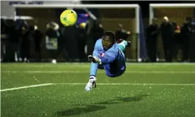  ??  ?? Haringey Borough goalkeeper Valery Pajetat dives for the ball during the FA Cup qualifying replay against Yeovil, who won 3-0. Photograph: Steven Paston/PA