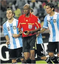  ??  ?? TAINTED: Referee Ibrahim Chaibou of Niger during a match in 2011. He is accused of helping to fix games before the 2010 World Cup