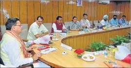  ?? HT PHOTO ?? Chief minister Pushkar Singh Dhami chairs the cabinet meeting in Dehradun on Thursday.