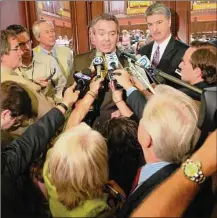  ?? File photo ?? Then-House Speaker James Amann, center, in 2007.