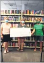  ??  ?? Recently, Boyertown Junior Woman’s Club president Judy Wetzel (left) and BJWC member Anita Zuber (right) presented a check in the amount of $500 to Susan Lopez of the Boyertown Community Library.
