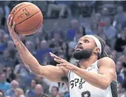  ?? USA TODAY SPORTS ?? The Spurs’ Patty Mills drives to the basket.