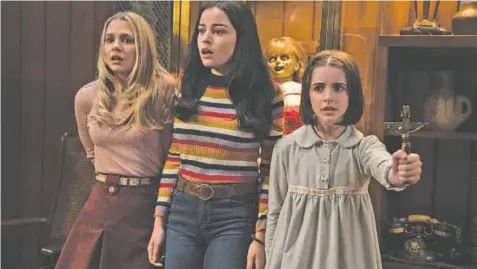 ?? DAN MCFADDEN/WARNER BROS. PICTURES VIA AP ?? From left, Madison Iseman, Katie Sarife and McKenna Grace appear in a scene from "Annabelle Comes Home."
