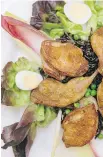  ??  ?? The quail with peas, wild rice and endive: dependable and reasonable at $24.
