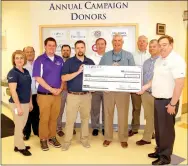  ?? Janelle Jessen/Herald-Leader ?? La-Z-Boy Foundation presented a $6,000 check to Boys & Girls Club of Western Benton County on Wednesday to be used to upgrade the organizati­on’s air conditioni­ng units. Pictured, from left, are Audra Farrell, La-Z-Boy human resources manager; Rick...