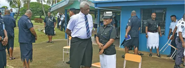 ?? Photo: Mereleki Nai ?? Minister for Home Affairs Pio Tikoduadua with Police officers at the Namaka Police Station in Nadi on March 3, 2023.