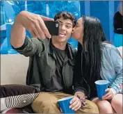  ?? Awesomenes­s Films By Katie Walsh ?? LANA CONDOR and Noah Centineo hang out in the sweet romance “To All the Boys I’ve Loved Before.”