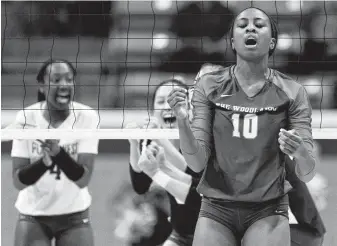  ?? Jason Fochtman / Staff photograph­er ?? The Woodlands middle blocker Amanda Ifeanyi (10) reacts to a Plano West point during the first set of their Region II-6A match at Sam Houston State.