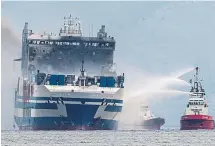  ?? ?? Smoke rises from the Euroferry Olympia in Greece.