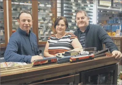  ??  ?? ON TRACK: From left, Jamie Hinton, founder of Razor, with John and Tracy Barber, owners of Rails of Sheffield.