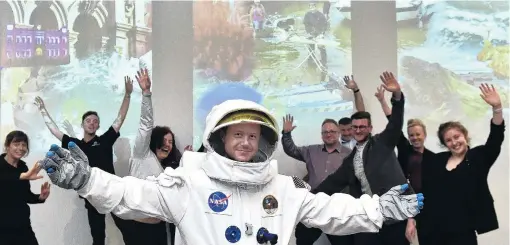  ?? PHOTO: PETER MCINTOSH ?? Danceoff . . . Max Mollinson (centre) and other Otago Museum staff are taking on museums around the world with their exuberant dance moves.