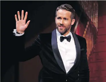  ?? — THE ASSOCIATED PRESS FILES ?? Ryan Reynolds says he ‘fell in love’ with the script for his latest project, a rom-com about a destinatio­n wedding hijacked by criminals.