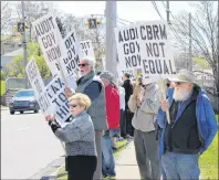  ?? NANCY KING/CAPE BRETON POST ?? About 200 protesters took to the street along Kings Road in front of Cabot House Tuesday afternoon, calling for action from the provincial and federal government­s in giving Cape Breton a better share of equalizati­on funding.