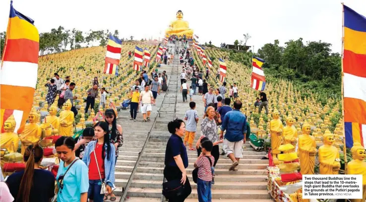  ?? HONG MENA ?? Two thousand Buddhas line the steps that lead to the 10-metrehigh giant Buddha that overlooks the grounds at the Putkiri pagoda in Takeo province.