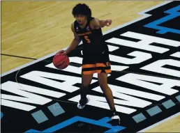  ?? PAUL SANCYA — THE ASSOCIATED PRESS ?? Oregon State guard Ethan Thompson says he knew “this success” was in the Beavers all season, despite the notion they were picked to finish last in the Pac-12 by the media.