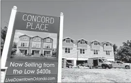  ?? John Raoux Associated Press ?? WIDER availabili­ty of mortgages could increase constructi­on by 7,000 condos, according to an analysis last year by HUD. Above, new condos in Orlando, Fla.