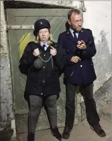  ??  ?? Chantal Doyle and Ciaran Davis gaurding the cells at Culture Night in Sligo Gaol last Friday.