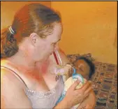  ?? Rachel Gritz ?? Rachel Gritz holds her grandson, Isaiah Gritz, in an undated photo. He was 8 years old when he died March 20 of what police said were abusive injuries.