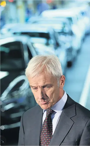  ?? GETTY ?? New Volkswagen CEO Matthias Müller tours the assembly line of the flagship factory in Wolfsburg yesterday