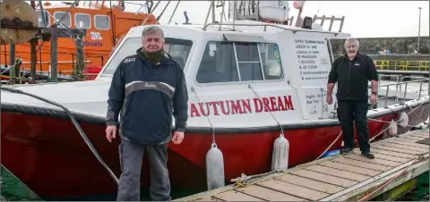  ??  ?? Eamonn Hayes (right) with his charter boat Autumn Dream, and his brother Nick who also has a charter boat in Kilmore Quay.