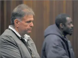  ?? PICTURE: OUPA MOKOENA ?? TRIAL: Johan Kotze with his co-accused, Andries Sithole, in court last week.
