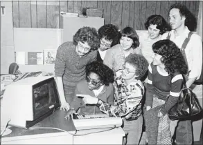  ?? Hearst Connecticu­t Media file photo ?? In 1978, journalism students from the University of Bridgeport try out one of the video display terminals at the Stamford Advocate that “has virtually replaced the typewriter.” Dave Smith, make up editor, center front, was a teacher at UB.