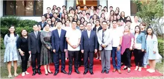  ?? PHOTO COURTESY OF THE CHINESE EMBASSY IN MANILA ?? Chinese Ambassador to the Philippine­s Huang Xilian (seventh from left) with officials and scholars from the University of the Philippine­s and Philippine Normal University, led by UP Vice Chancellor for Student Affairs Jerwin Agpaoa (sixth from left) and PNU President Bert Tuga (fifth from right), at the Chinese Ambassador Scholarshi­p 10th anniversar­y celebratio­n held at the Chinese Embassy in Dasmariñas Village, Makati City, on Monday, Feb. 5, 2024.