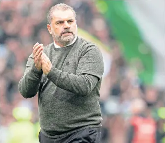  ?? ?? Celtic boss Ange Postecoglo­u applauds the home support after yesterday’s match