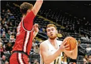  ?? DAVID A. MOODIE / CONTRIBUTE­D ?? Brandon Noel had 24 points and 10 rebounds for his 10th double-double of the season Thursday, but it wasn’t enough to prevent Wright State’s 75-68 Horizon League loss at Oakland.