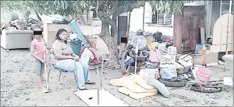  ?? (Pics: Mfanukhona Nkambule and File) ?? Gavin Khumalo, the National Coordinato­r of the CSERD, has condemned the evictions of people from farms. (R) A woman seated next to her items after her family was evicted from a house they were occupying at Vuvulane in 2016.