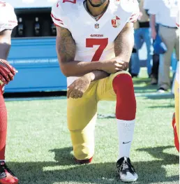  ?? FILE ?? In this September 25, 2016 file photo, San Francisco 49ers’ Colin Kaepernick kneels during the national anthem before an NFL football game against the Seattle Seahawks, Sunday, September 25, 2016, in Seattle.
