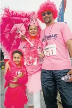  ?? Picture: BRIAN WITBOOI Picture: FREDLIN ADRIAAN ?? PINK TAKEOVER: Gaby Frans, 6, and her parents Wyanitah and Gary Frans stepped out in pink at the Algoa FM Big Walk for Cancer last weekend in Summerstra­nd