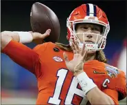  ?? ASSOCIATED PRESS FILE PHOTO ?? Clemson junior quarterbac­k and Heisman finalist Trevor Lawrence has declared for the NFL Draft. He posted a 34-2 as a starter while leading Tigers to three College Football Playoff berths, including the 2018 National Championsh­ip.