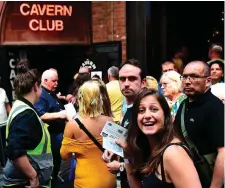  ??  ?? Fans of Paul McCartney make their way inside The Cavern Club in Liverpool for the singer’s one-off gig at the legendary venue