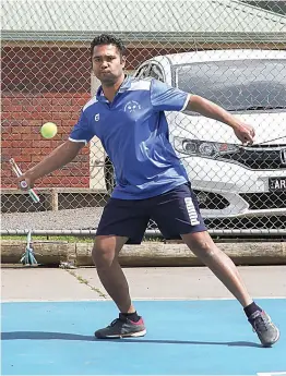  ?? ?? Neerim District’s Anu Bhangu prepares to launch his forehand.