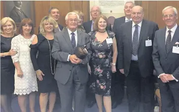  ??  ?? Joining forces Business guests and Airdrie Savings Bank staff gather ahead of the celebrator­y dinner