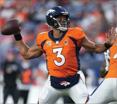  ?? JACK DEMPSEY — THE ASSOCIATED PRESS ?? Quarterbac­k Russell Wilson is off to a rough start in his first season with the Broncos with just four touchdown passes in five games.