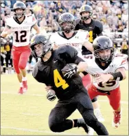  ?? RICK PECK/MCDONALD COUNTY PRESS ?? McDonald County defensive back Kennedy Hodson dives in an attempt to stop Cassville’s Logan Carlin during the Mustangs 21-14 win on Sept. 8 at Cassville High School.