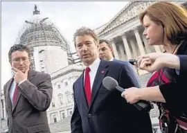  ?? Drew Angerer
Getty Images ?? SEN. RAND PAUL of Kentucky has clashed with Republican leaders over his attacks on the NSA and his call for a less interventi­onist foreign policy.