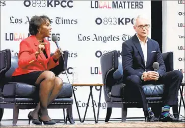  ?? Gary Coronado Los Angeles Times ?? DIST. ATTY. Jackie Lacey and challenger George Gascón appear at a candidates’ debate in L.A. last month.