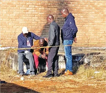  ?? / Coceka Magubeni ?? Lawrence Magadla, in brown jacket, sobs uncontroll­ably after news broke that the the body oof his six-year-old boy, Khayalethu, had been found .02/07/2022.