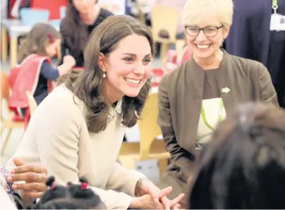  ?? Richard Pohle/The Times ?? > Kate during her visit to Hornsey Road Children’s Centre, London, yesterday