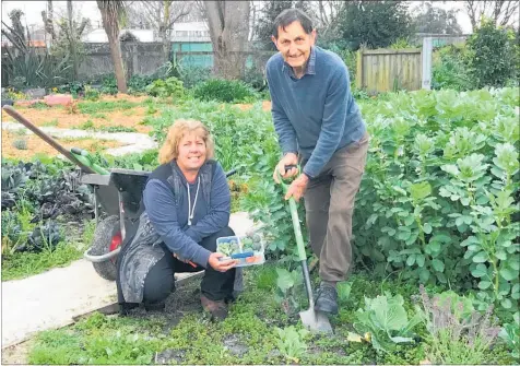  ??  ?? Anderson Park Community Group members Bob Hall and Shelley Draper say the addition of a place to shelter will enhance the community garden and surroundin­g area.