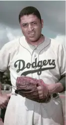  ?? AP ?? Dodgers pitcher Don Newcombe was one of the first black players in the majors. He won Rookie of the Year, MVP and Cy Young awards in his career.