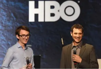  ?? KEVIN WINTER/GETTY IMAGES ?? Actor Isaac Hempstead Wright, left, and composer Ramin Djawadi are bringing Game of Thrones music to 28 cities.