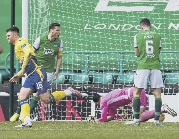  ??  ?? 0 St Johnstone’s Glenn Middleton wheels away in celebratio­n after scoring what proved the winner at Easter Road on Saturday. A mistake by Ryan Porteous led to the goal