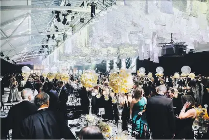  ?? KAREL CHLADEK ?? METALLIC MAGIC: Guests celebrate in shimmering style at the 25th anniversar­y silver-themed Daffodil Ball at Windsor Station.