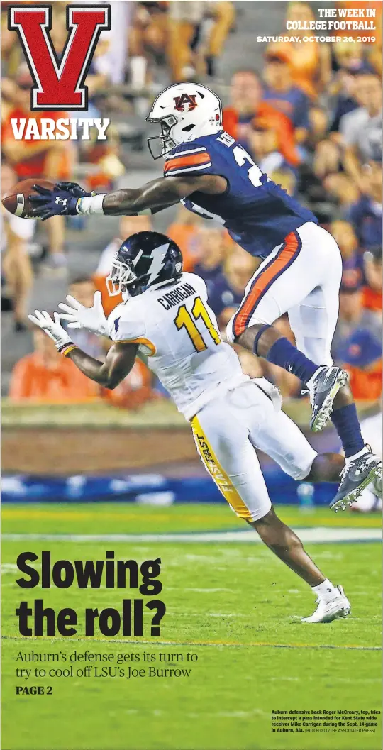  ?? [BUTCH DILL/THE ASSOCIATED PRESS] ?? Auburn defensive back Roger McCreary, top, tries to intercept a pass intended for Kent State wide receiver Mike Carrigan during the Sept. 14 game in Auburn, Ala.